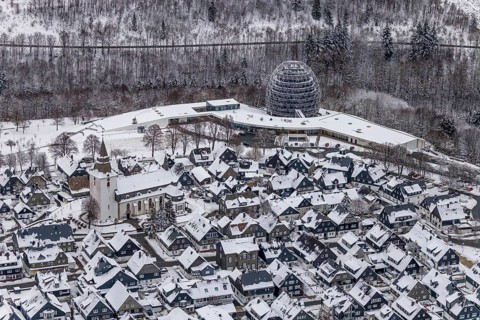 Aerial view of the snowy winter landscape of Winterberg with deserted streets during the corona