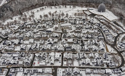 Aerial view of the snowy winter landscape of Winterberg with deserted streets during the Corona