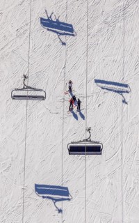 Skiers on ski slope and chairlift, Winterberg, Sauerland, North Rhine-Westphalia, Germany, DE,