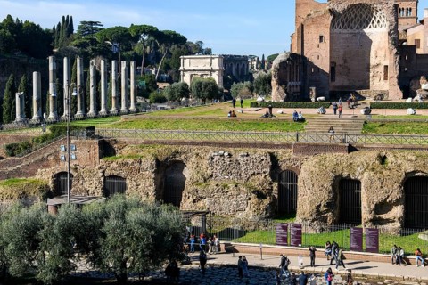 Foundations of the substructure of the Temple of Venus and Roma, Arch of Titus on the left in the