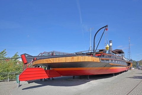 Historic tugboat Gustav Zeuner built in 1894, steamer, tugboat, stern, rudder, open-air museum,