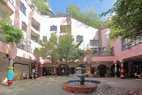 Inner courtyard with fountain, Green Citadel, Hundertwasser House, Magdeburg, Saxony-Anhalt,