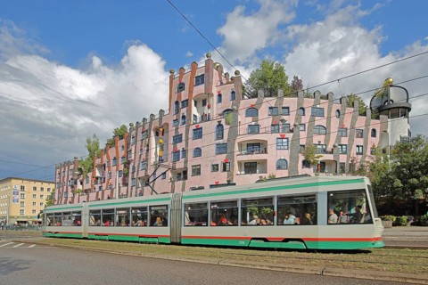 Green Citadel, Hundertwasser House and tram, local transport, Magdeburg, Saxony-Anhalt, Germany