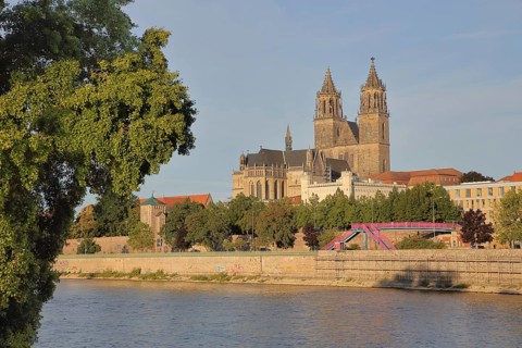 Cityscape with Gothic cathedral, city wall with defence defence tower Kiek in de Köken and building
