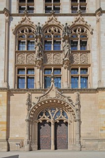 Portal with decorations and figures from the historic labour court, courthouse, entrance,