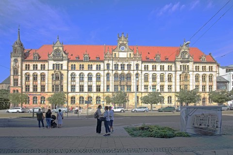 Historic labour court, courthouse and pedestrians, Magdeburg, Saxony-Anhalt, Germany