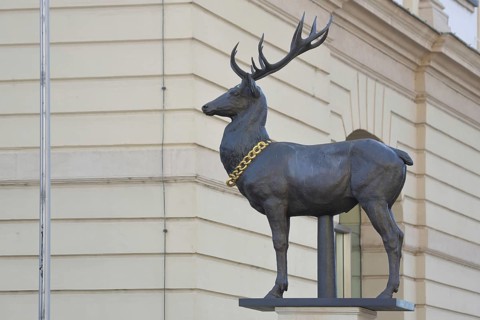 Stag column with stag statue, stag figure with golden collar, golden chain, Old Town Hall, Old