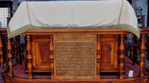 Ornate wooden construction with historical inscription, Kahal Shalom Synagogue, Sephardic