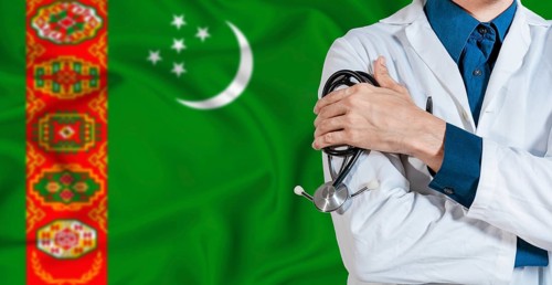 Doctor with stethoscope on Turkmenistan flag. Doctor holding stethoscope on Turkmen flag