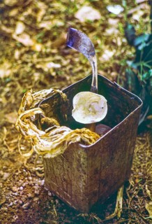Tin box container container tools used by rubber tapper, Malaya, Malaysia, south east Asia 1963