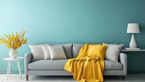 Turquoise Wall Living Room With Grey Sofa, Yellow Blanket, And Flowers. Study Table And Decorative