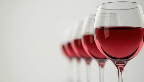 Continuous Flow Of Wine Glass: A Stream Of Wine Glass Pouring Into A Container To Create An