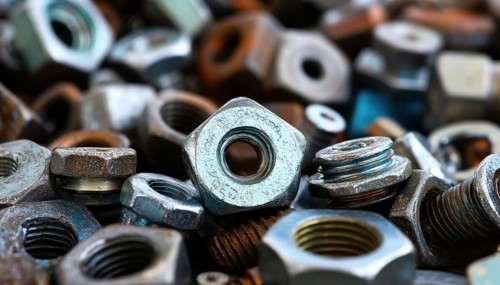 Fasteners And Hardware On A Simple Surface - Discover The World Of Nuts And Bolts On A Plain, With