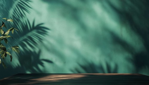 Empty Table On Dark Green Wall With Botanical Shadows: Ideal Mock-Up For Presentations And Branding