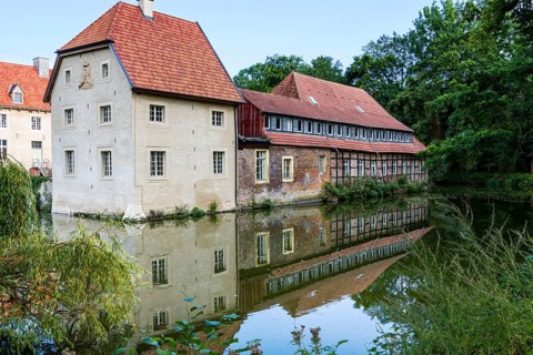 Water reflection, Senden Castle, Senden, North Rhine-Westphalia, Germany