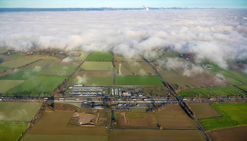 Aerial view, fog over Büderich and Holtum as well as construction site and extension of the
