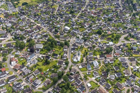 Aerial view, city centre view and Roman Catholic parish church of St. Kunibertus, Hünsborn, Wenden,