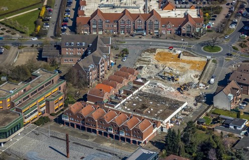 Aerial view, town hall, construction site and demolition for new business centre at the town hall
