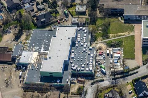 Aerial view, construction site roof renovation and remodelling of the Comenius comprehensive