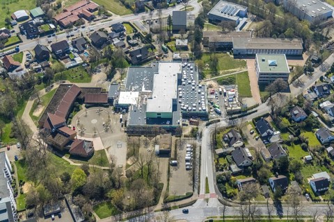 Aerial view, construction site roof renovation and remodelling of the Comenius comprehensive