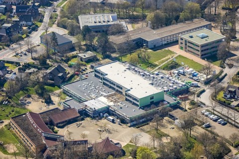 Aerial view, construction site roof renovation and remodelling of the Comenius comprehensive