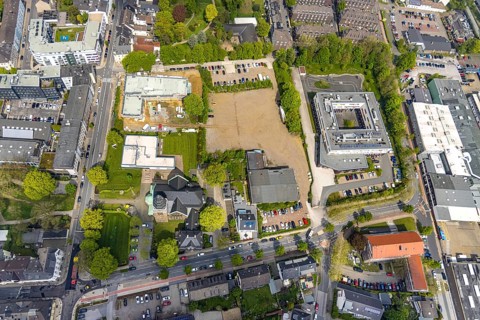 Aerial view, evang. Christuskirche, construction site and new building hospice and palliative
