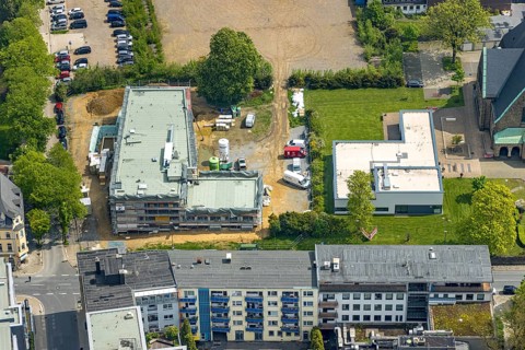 Aerial view, evang. Christuskirche, construction site and new building hospice and palliative