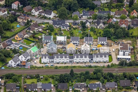 Aerial view, construction site and new construction of residential buildings at Hof Drücke