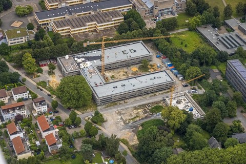 Aerial view, construction site and new building Bildungscampus Unna, new building kindergarten