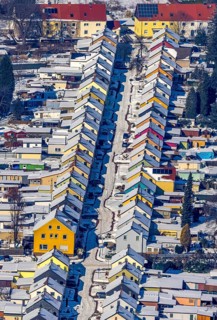 Aerial view, Friedrichstraße colliery housing estate, coloured house facades in the snow,