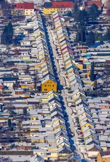 Aerial view, Friedrichstraße colliery housing estate, coloured house facades in the snow,