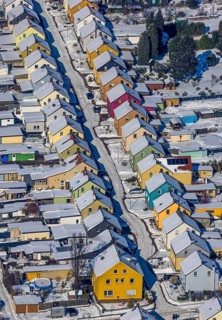 Aerial view, Friedrichstraße colliery housing estate, coloured house facades in winter, Königsborn,