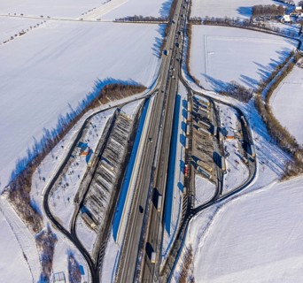 Aerial photo, Ostönner Grund rest area on the A44 motorway, snow, winter, rest areas, trucks,