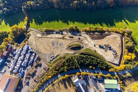Aerial view, construction sites in the industrial area at the federal road B511 in the district