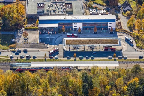 Aerial view, bus station and construction work at the vocational college Olsberg of the HSK in