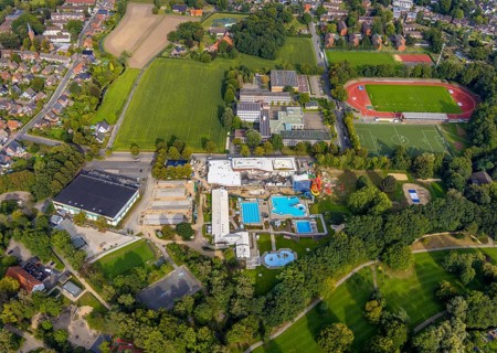 Aerial view, construction site and new construction of an indoor swimming pool at the Rheine