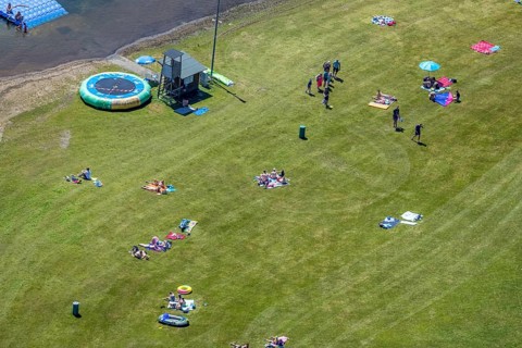 Aerial view, Biggesee, Camping Biggesee - Vier Jahreszeiten, bathers on sunbathing lawn, Sondern,