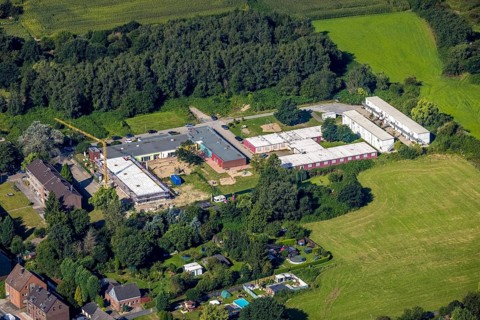 Aerial view, construction site and new building at the municip. Day care centre Holten in