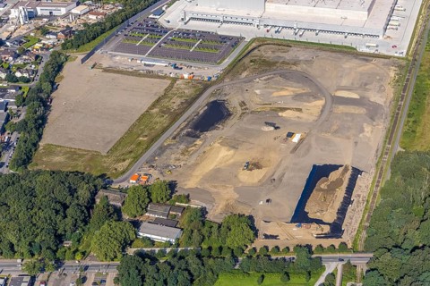 Aerial view, Edeka central warehouse Oberhausen with fallow land in the industrial park Waldteich