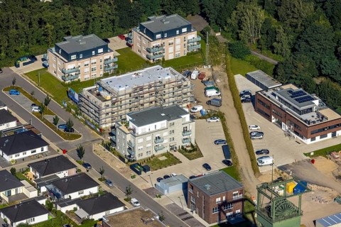 Aerial view, construction site and new construction residential buildings Auf dem Schacht am OLGA