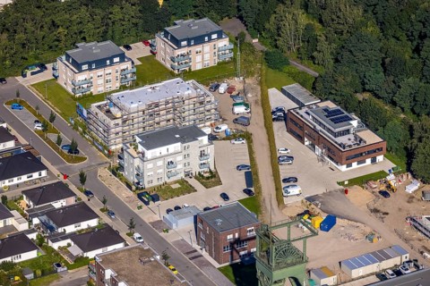 Aerial view, construction site and new construction residential buildings Auf dem Schacht am OLGA