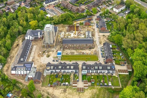 Aerial view, construction site and new construction residential buildings Am Schacht IV, Kursana