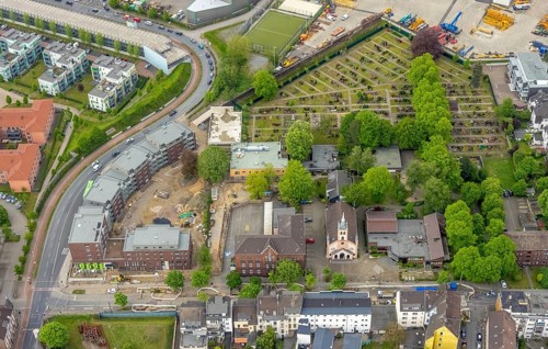 Aerial view, construction site and new building day care centre and flats, psychosocial health