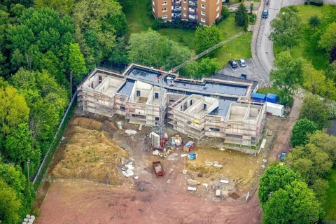 Aerial view, construction site and new building day care centre Drei Knappen on the former sports