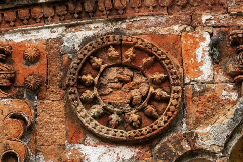 Intricate circular stone design in ancient architecture with detailed carvings-Dhaka, Bangladesh