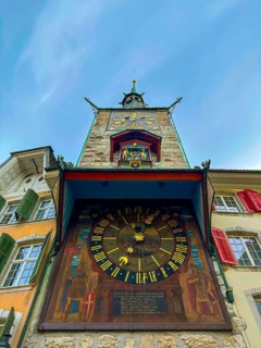 The Zeitglockenturm Clock Tower and Colorful House Facades on the Market Square in the Heart of the