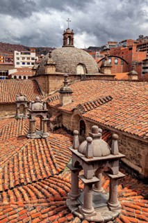 View of the interlocking roofs of a church with the surrounding town, San Fransisco Cathedral in La