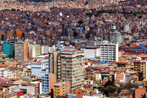 View of a city with many buildings in densely populated surroundings, The houses and skyscrapers of
