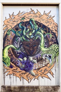 Mythical motif with Medusa and several snakes in a circular design, at Linz harbour Upper Austria