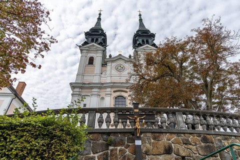 View of a baroque church with autumnal trees in the foreground, Pöstlingsbergkirche pilgrimage